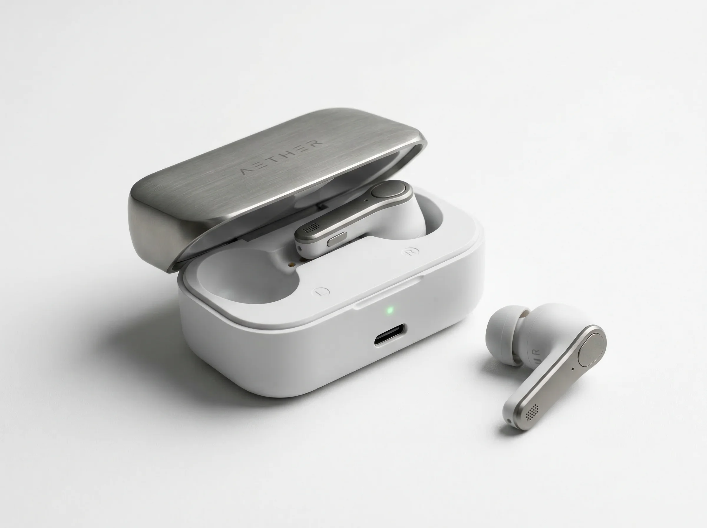Wireless earbuds and charging case in matte white with titanium accents
