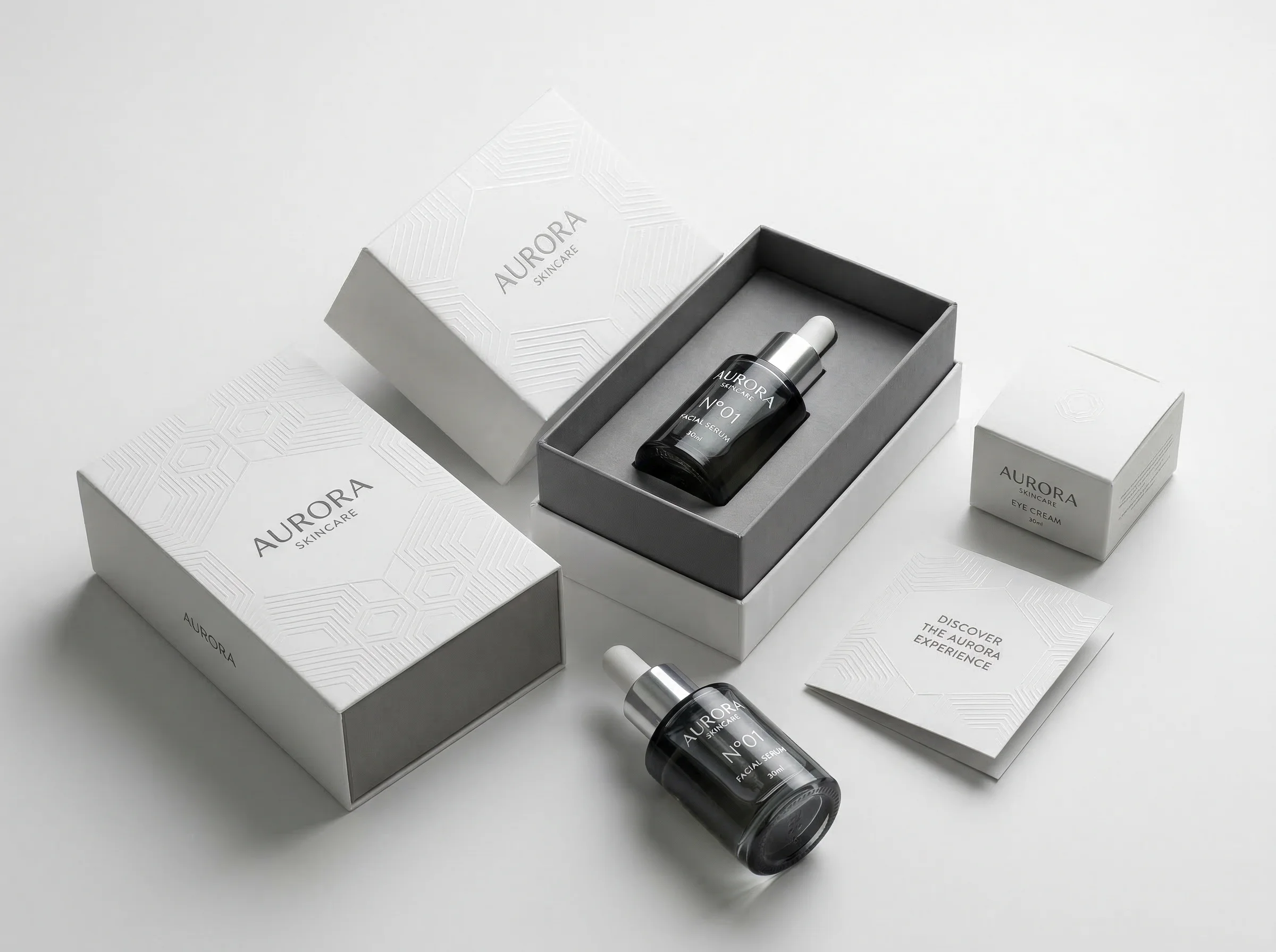 Premium skincare packaging design with embossed patterns and matte finishes